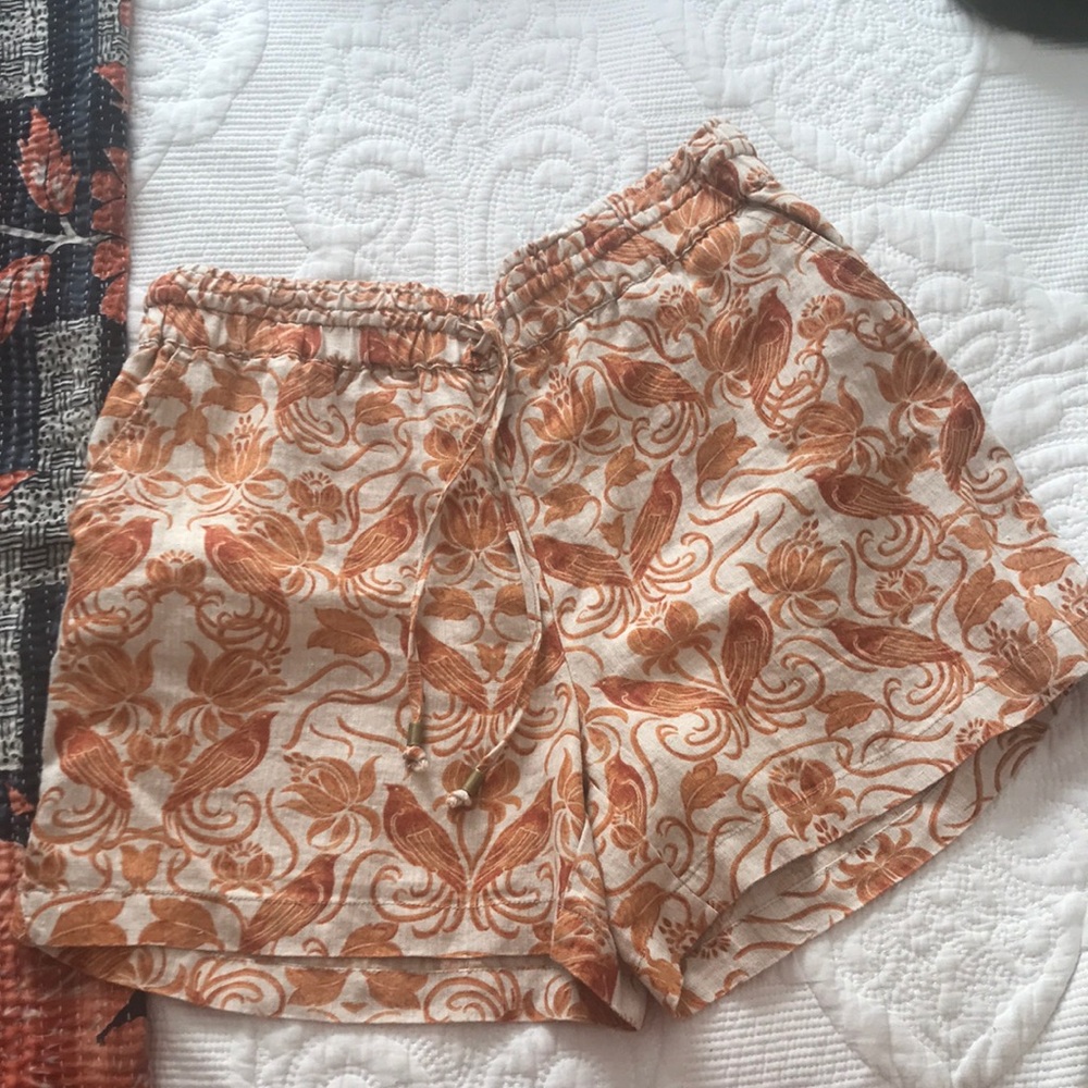 Anthro orange pattern linen shorts.